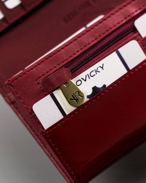 Duży, pojemny portfel damski ze skóry lakierowanej na zatrzask - Rovicky Duży, pojemny portfel damski ze skóry lakierowanej na zatrzask - Rovicky